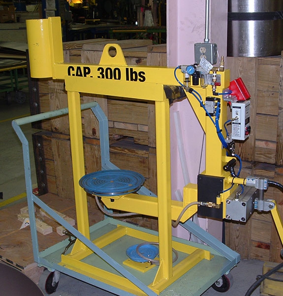 Vacuum lifter with air powered rotation
