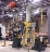 Overhead Vertical Mast Manipulator with vacuum lifter